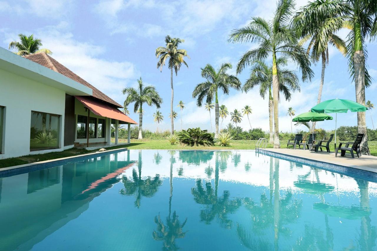 Oyo 26874 Manor Backwater Resort Кумараком Экстерьер фото