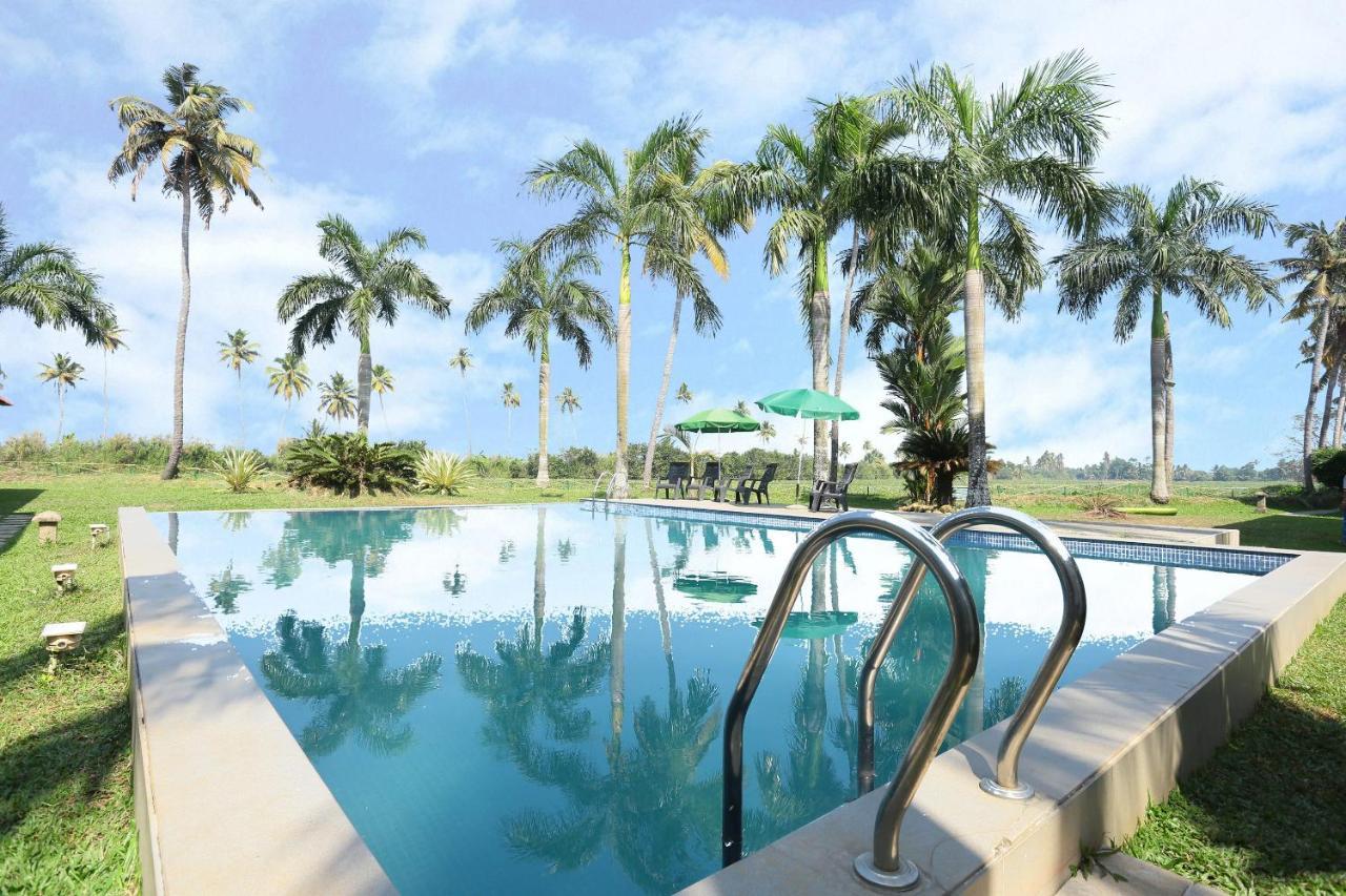 Oyo 26874 Manor Backwater Resort Кумараком Экстерьер фото